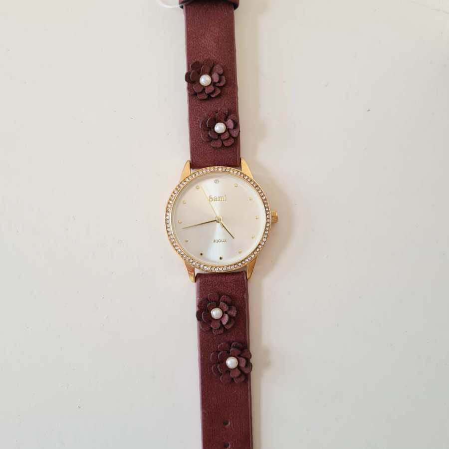 horloge parels bloemen