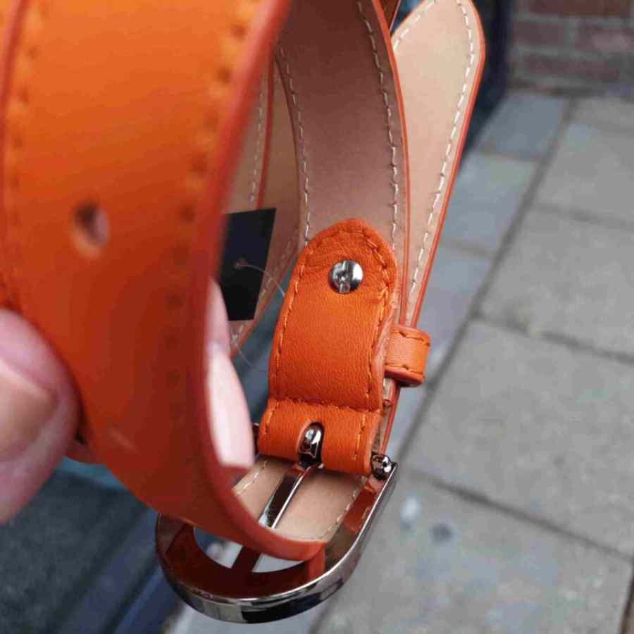 Leren riem 25mm zilveren gesp in oranje schroef