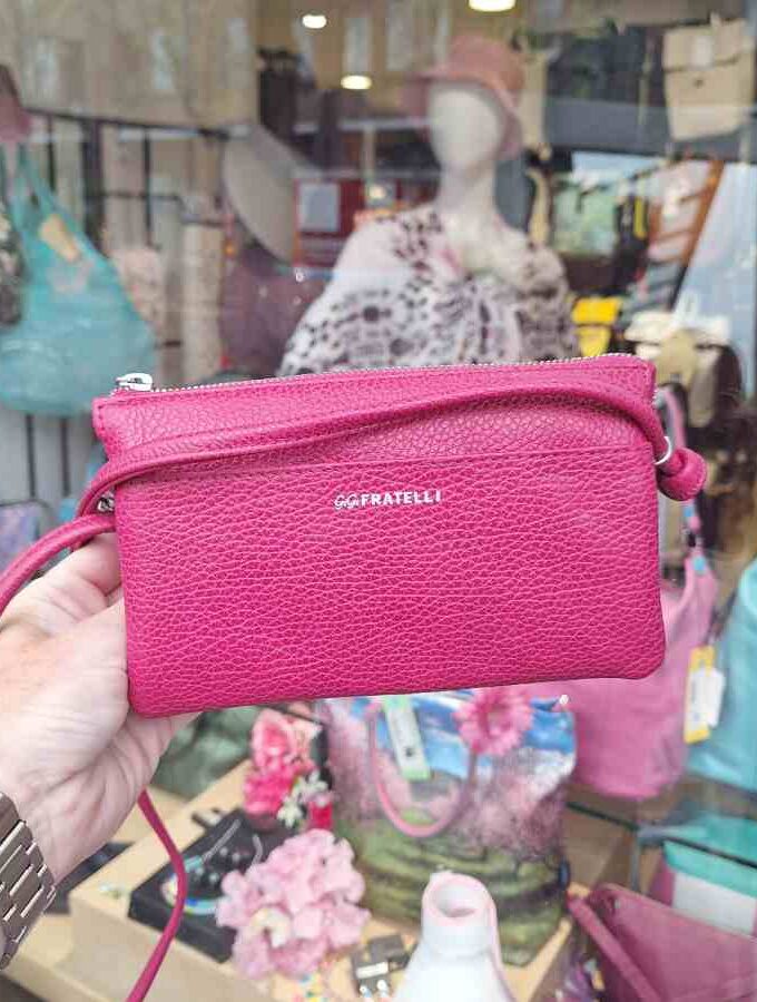 Roze leren clutch met lange schouderband Gigi